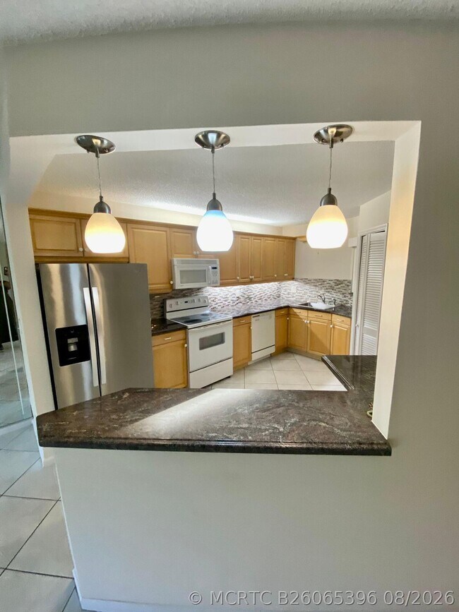 Building Photo - 5900 Camino Del Sol