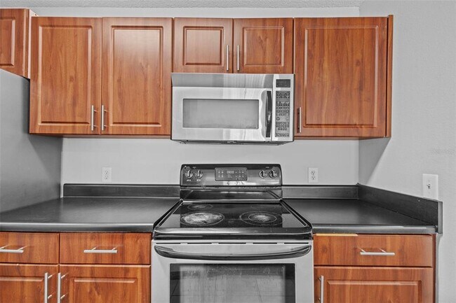 Building Photo - 9481 Highland Oak Dr