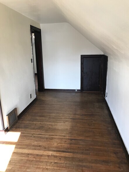 2 storage closets off the living room, one that runs the full length of the front of the house - 3226 Milwaukee St