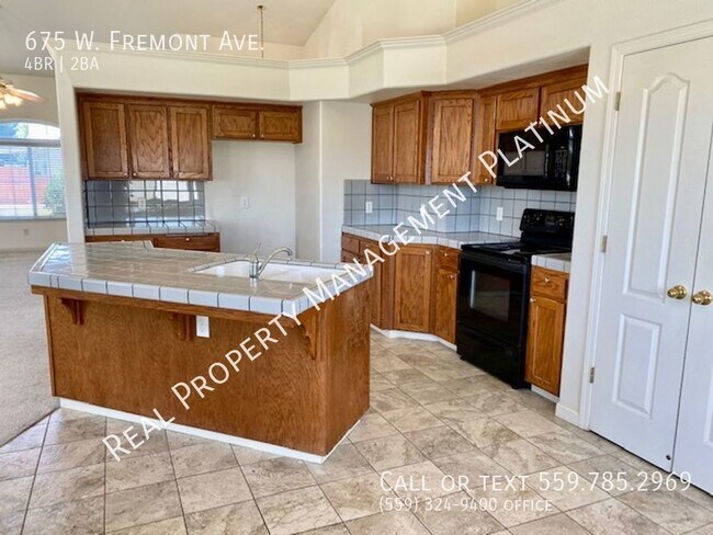 Building Photo - $2,395  Willow and Herndon, 4 Bedroom,  - ...