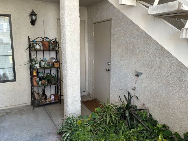 Building Photo - Condo 3 bedrooms 2 bathrooms 1 car garage gated subdivision.