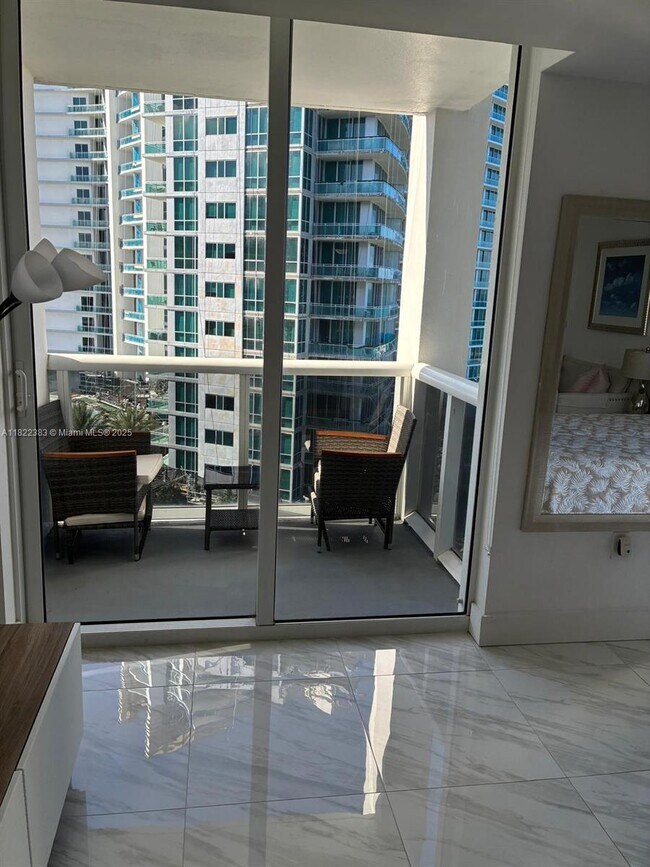 Building Photo - 10275 Collins Ave