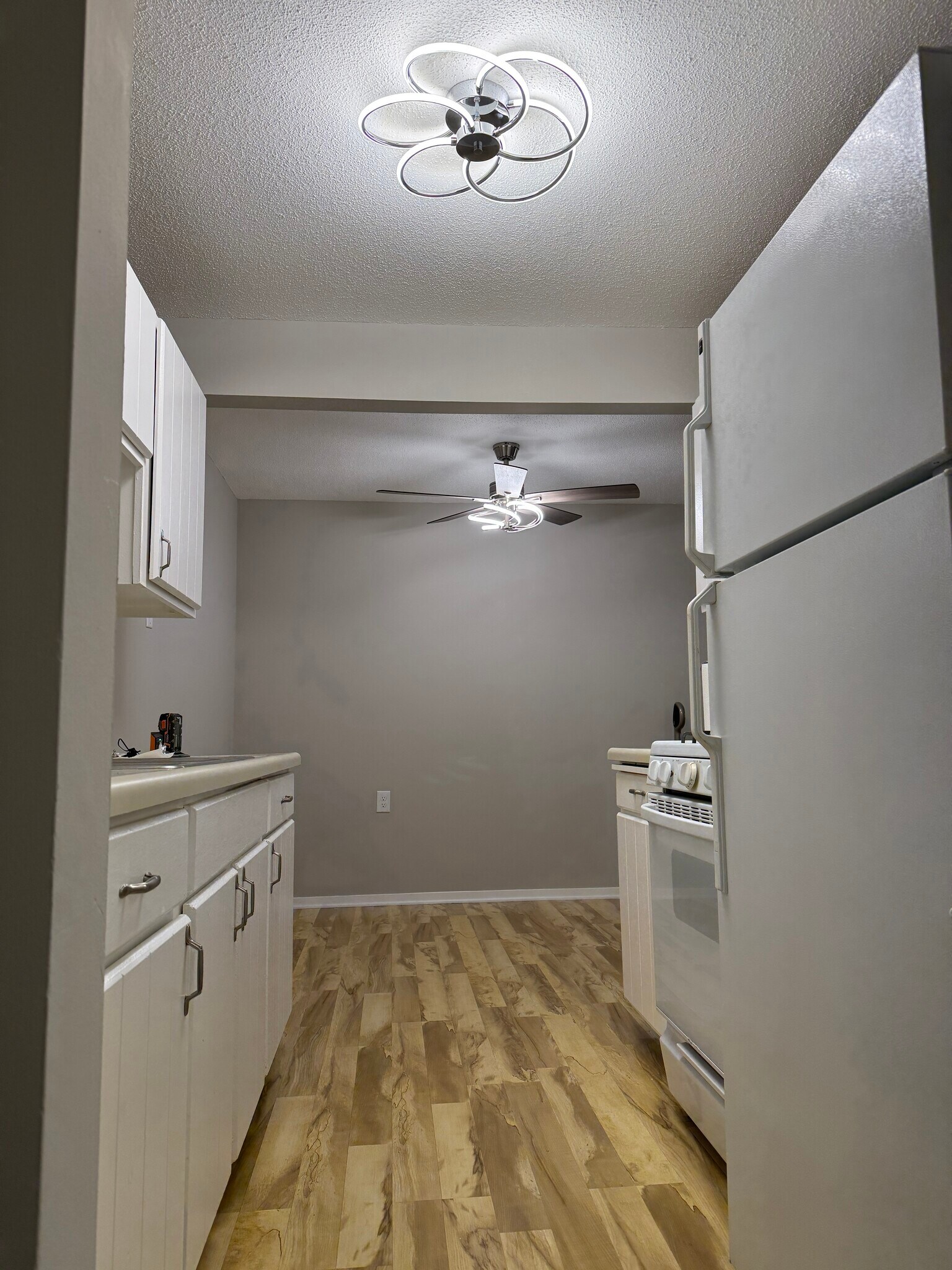 Looking Into Kitchen After Entering Condo - 9400 Old Cedar Ave S