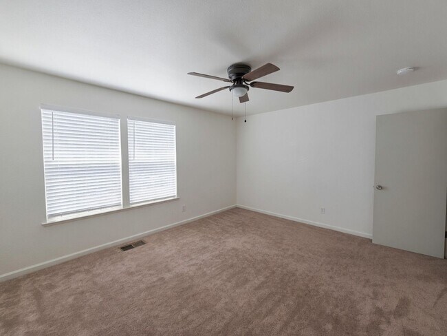 Building Photo - Spacious 4-Bedroom Home with Solar, Finished Garage, Large Pantry & Low-Maintenance Backyard in M...
