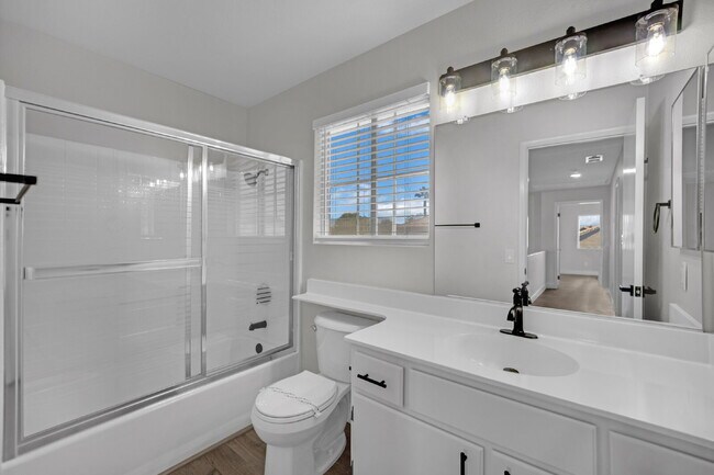 Building Photo - Step into this charming 3-bedroom, 3-bathroom home that has so much to offer!