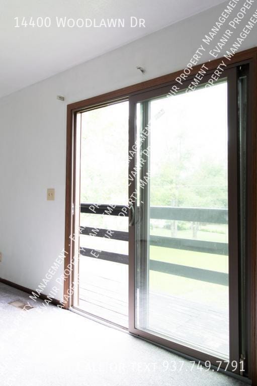 Building Photo - 14400 Woodlawn Dr