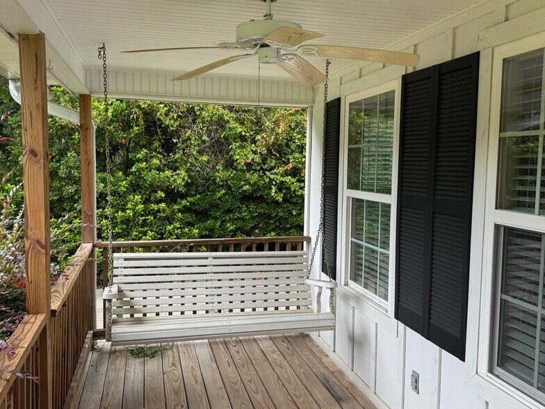 Front porch and porch swing - 306 W College St