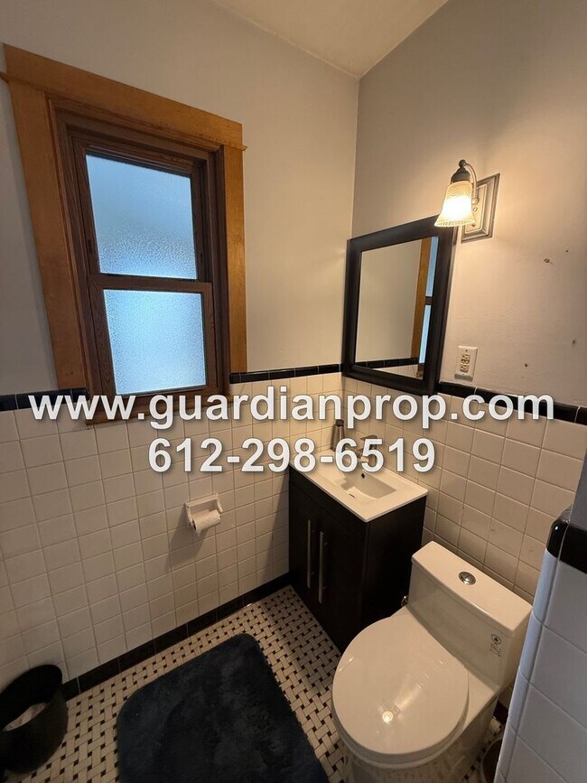 Building Photo - Merriam Park House Available May 1st, Updated Kitchen, Office, Fenced Yard, 2 Car Garage