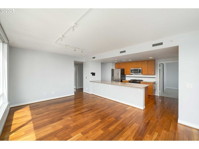 Building Photo - Modern 2-Bed/2-Bath Condo with Balcony & Prime Downtown Location