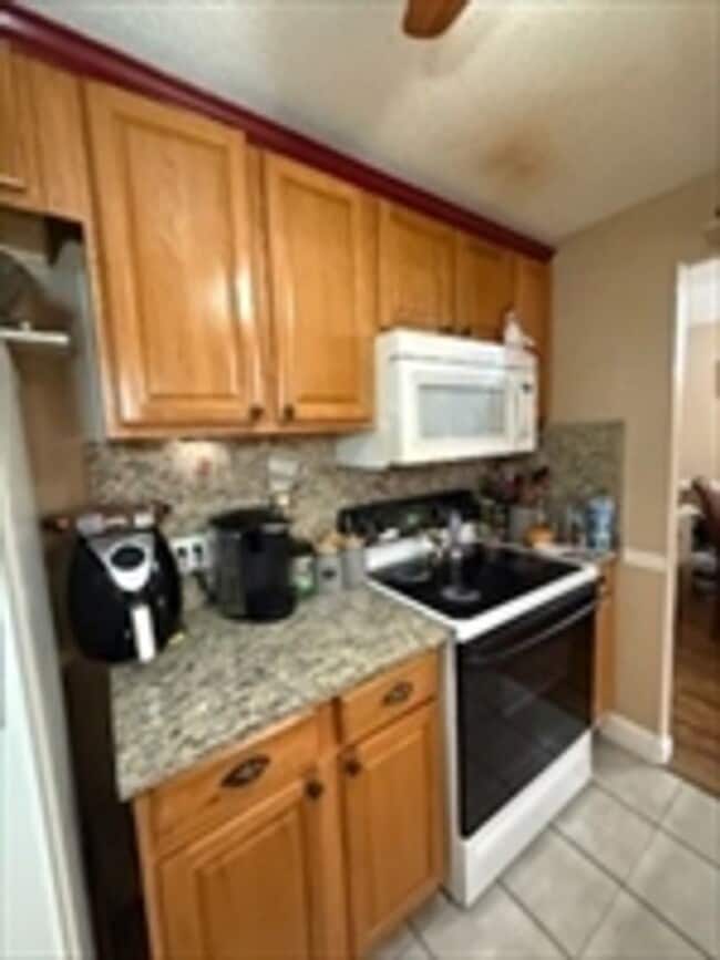 Building Photo - Modern Comfort Meets Convenience in This Stylish Franklin Condo