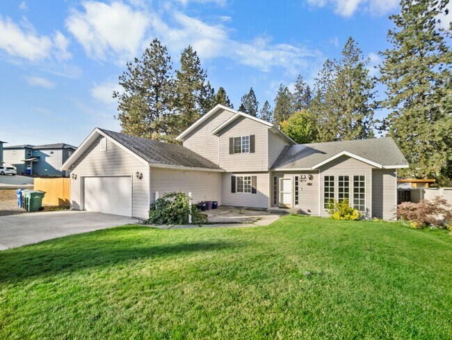 Primary Photo - Spacious Home with Fenced Yard & Garage – ...