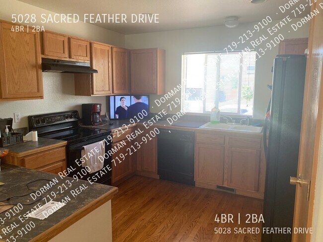 Building Photo - 5028 Sacred Feather Dr