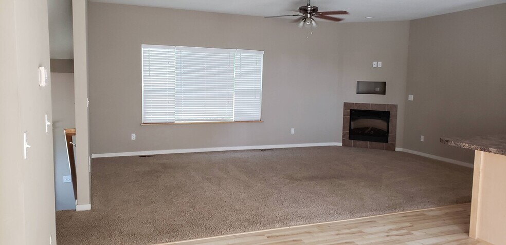 Living room with fireplace - 301 SE 11th St