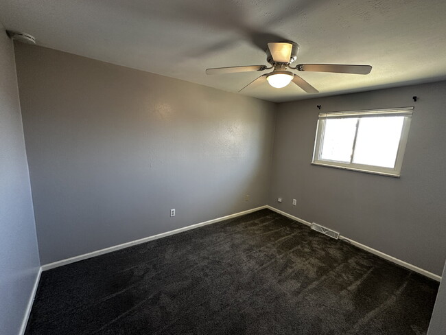 Building Photo - "Spacious 3-Bedroom Retreat with Finished ...