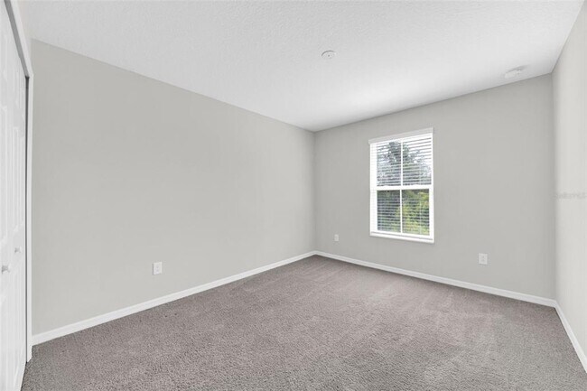 Building Photo - 6321 Tillandsia Pl
