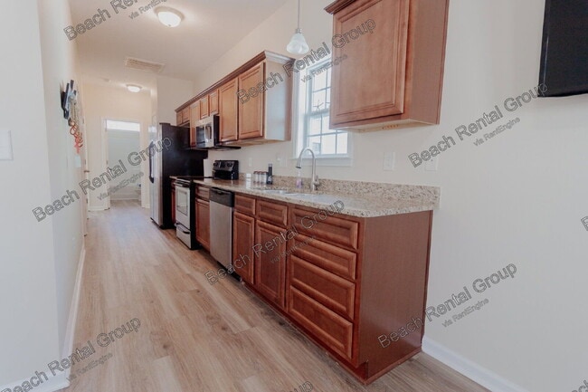 Building Photo - 605 Surfsong Way