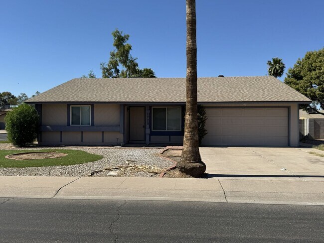 Building Photo - CORNER LOT 3 BEDROOM PLUS DEN WITH FIREPLACE AND LARGE YARD