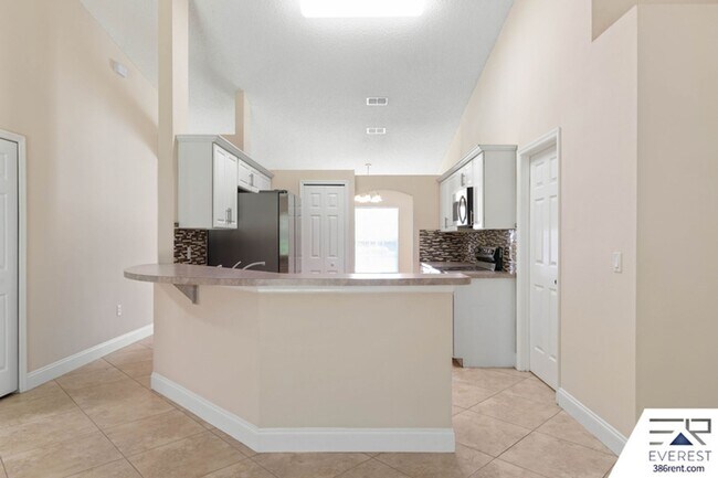 Building Photo - FULLY FENCED 3/2/2 IN THE HEART OF PALM COAST