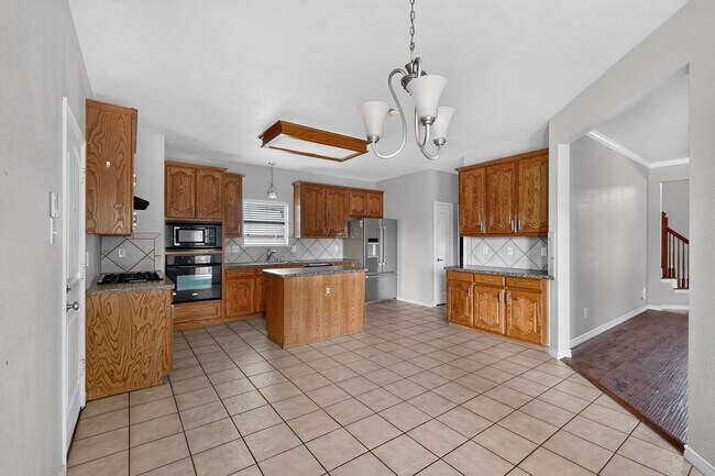 Building Photo - Spacious 4-Bedroom Home with Bonus Room and Large Backyard in Caruth Lake