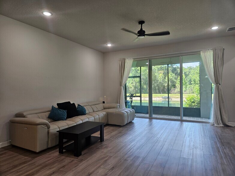 Beautiful_LivingAreaView1 - 26030 Fantasy Sky Ln
