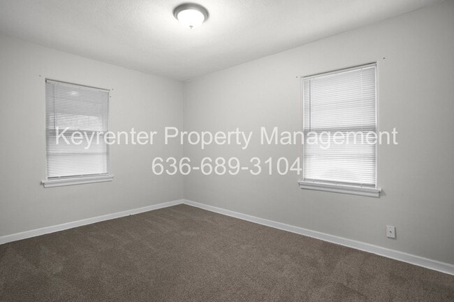 Building Photo - 1045 N New Florissant Rd