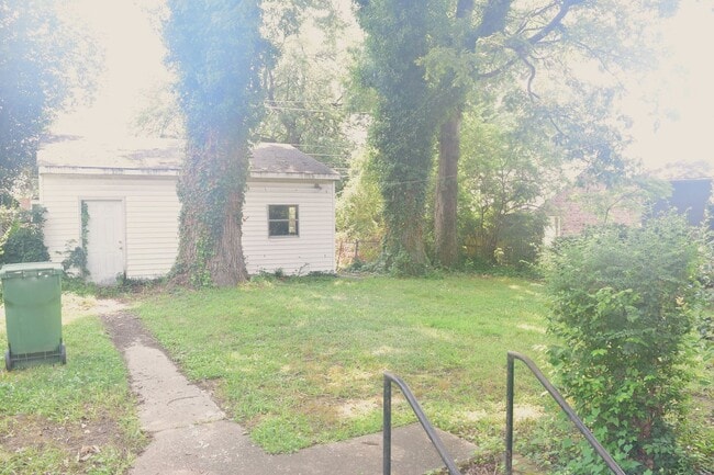 Building Photo - Charming Northside Two-Story Brick Home With 2 car garage and basement