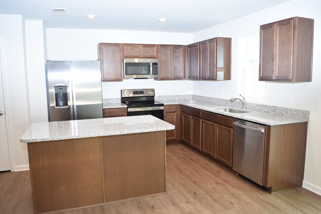 Building Photo - Modern 3-Bedroom Townhome in Desirable Bear Park
