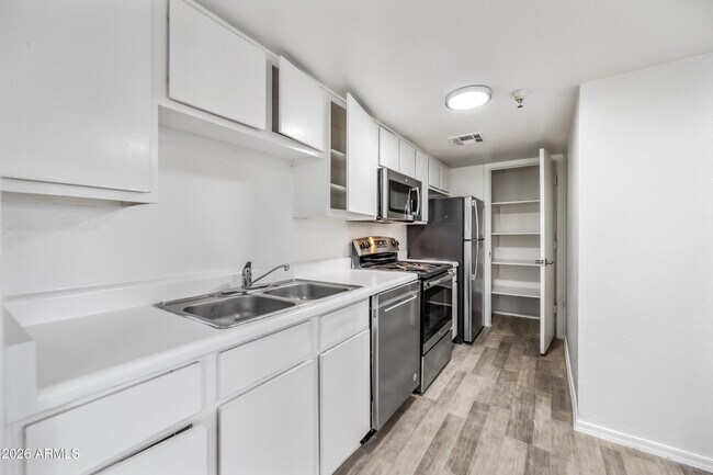 Building Photo - 3065 N 67th Ave