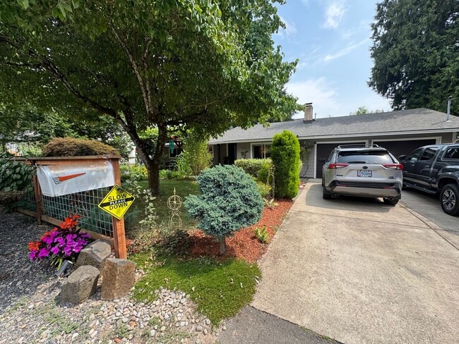 Building Photo - Spacious 4-Bedroom Home with Multiple Livi...