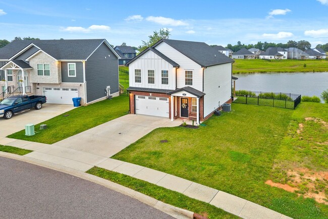 Building Photo - Stocked Pond, Walking Trails and More!!