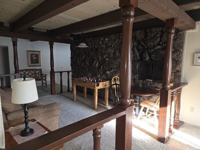 Building Photo - Unique open design,wood beams in all rooms-Very cheery and cozy. Newly remodeled, and newly furni...