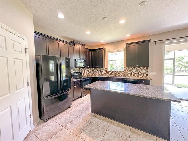 Building Photo - 8979 39th St Cir E