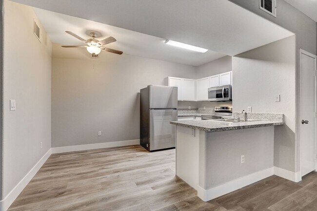 Building Photo - Upgrated upstairs 2 Bedrm 2 bath Gated Com...