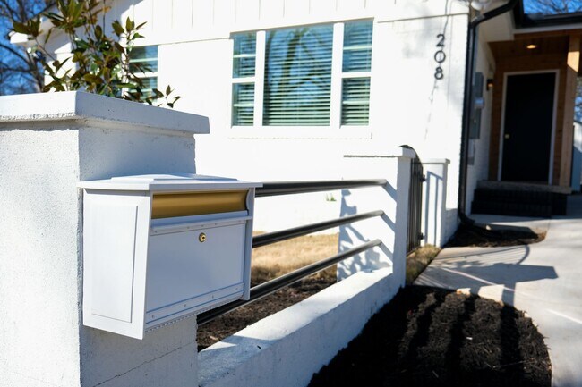 Building Photo - Custom Design Home in Greenville w/ Lawn C...