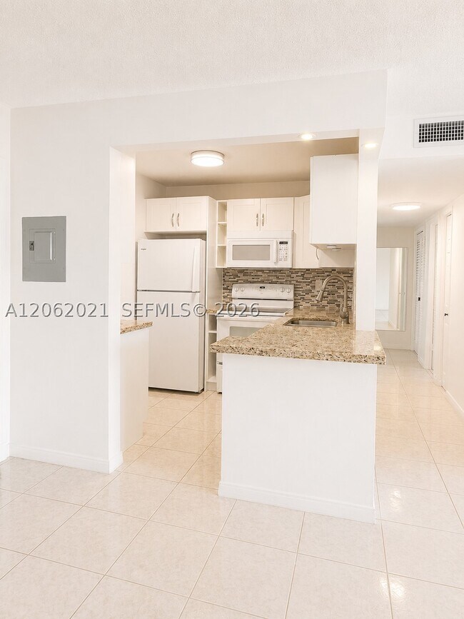 Building Photo - 6095 W 18th Ave
