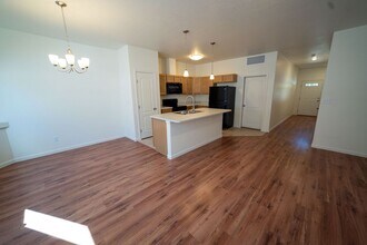 Building Photo - Perfect timing for fall semester! 3 Bedroom 1 1/2 Bath Townhome with Garage