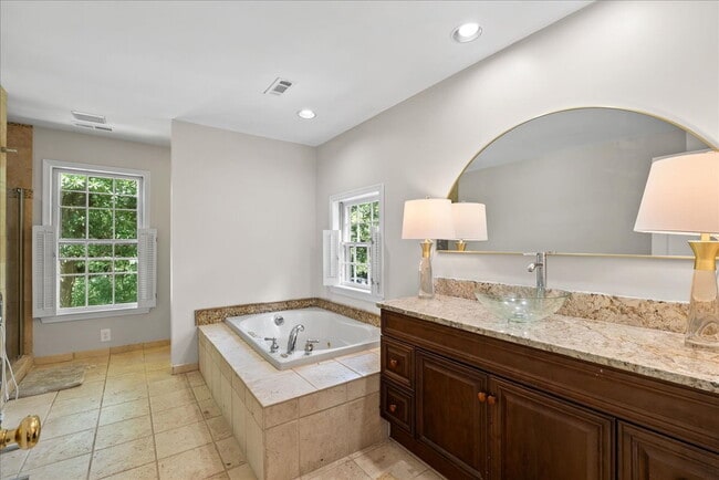Building Photo - "Luxurious 3-Bed Retreat with Finished Bas...