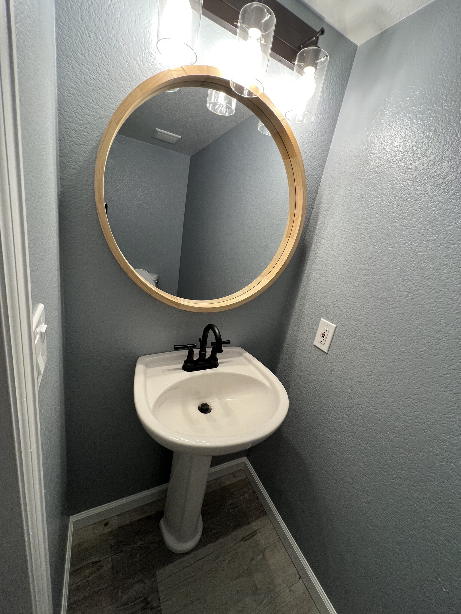 Powder room off kitchen - 7153 Arrowroot Ave