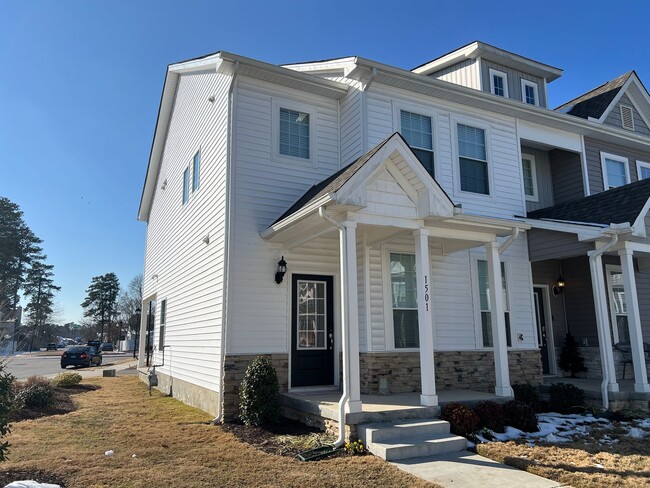 Primary Photo - End unit townhome in the new Huntington Po...