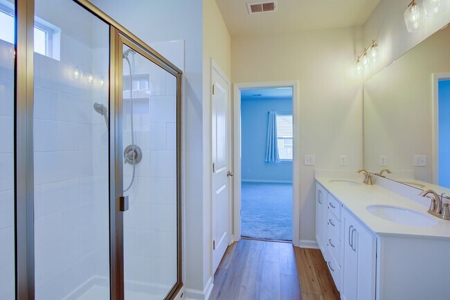 Building Photo - Spacious 4BR Rental with Stunning Kitchen & Covered Patio