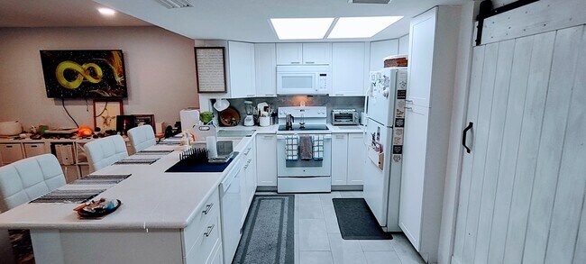 New Kitchen with Quartz counter tops, dishwasher, and plenty of storage - 3130 Seasons Way