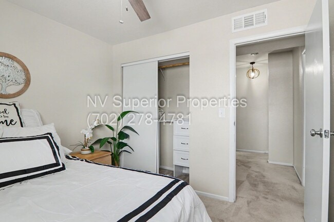 Building Photo - SE!! Close to UNLV!! 2 Bedroom 2 story!! 1 Car Carport!! Fully Furnished!! Community Pool!! and T...