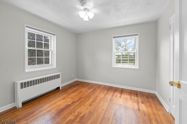 Building Photo - 4B Colfax Manor
