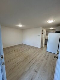 711 Living Room / Kitchen - Cedar Pointe Apartments