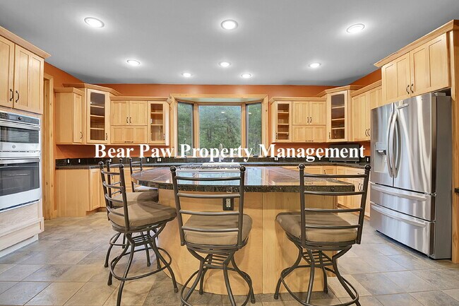 Building Photo - Spacious 4-Bedroom Retreat in Scenic Conif...