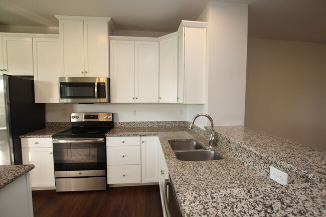 Building Photo - The Homestead- immaculate town home with c...