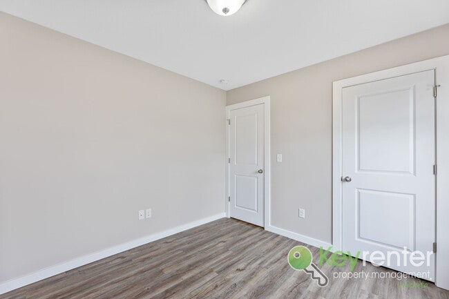 Building Photo - E 69th Ct N Duplex