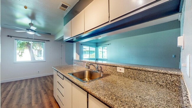 Building Photo - 2 story 2 bedroom 1 bath condo with covered parking, private storage and community pool!