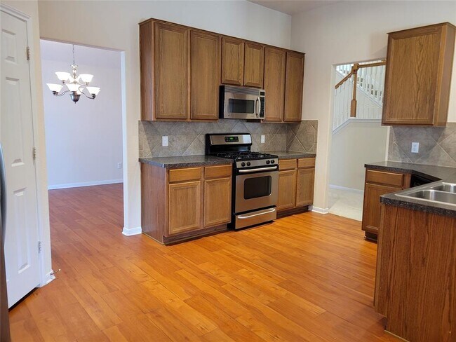 Building Photo - 6619 Halcyon Days Dr