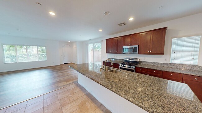 Building Photo - Available Now: Cozy 4 Bedroom 2.5 Bath Home in Rancho Cucamonga.